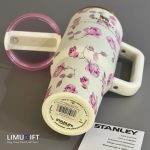 تراول ماگ استنلی گلدار Stanley Quencher طرح گل رز بنفش با بدنه سفید- کد 0286 - Image 5