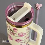 تراول ماگ استنلی گلدار Stanley Quencher طرح گل رز بنفش با بدنه سفید- کد 0286 - Image 6